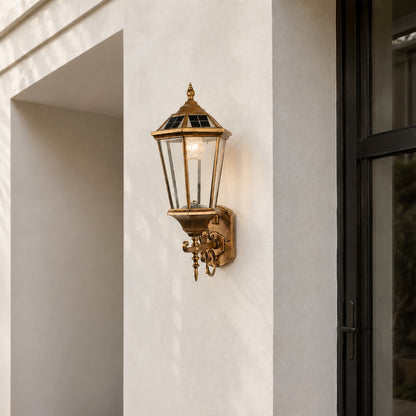 Vintage bronze outdoor wall light lifestyle image beside doorway for elegant classic exterior decor.