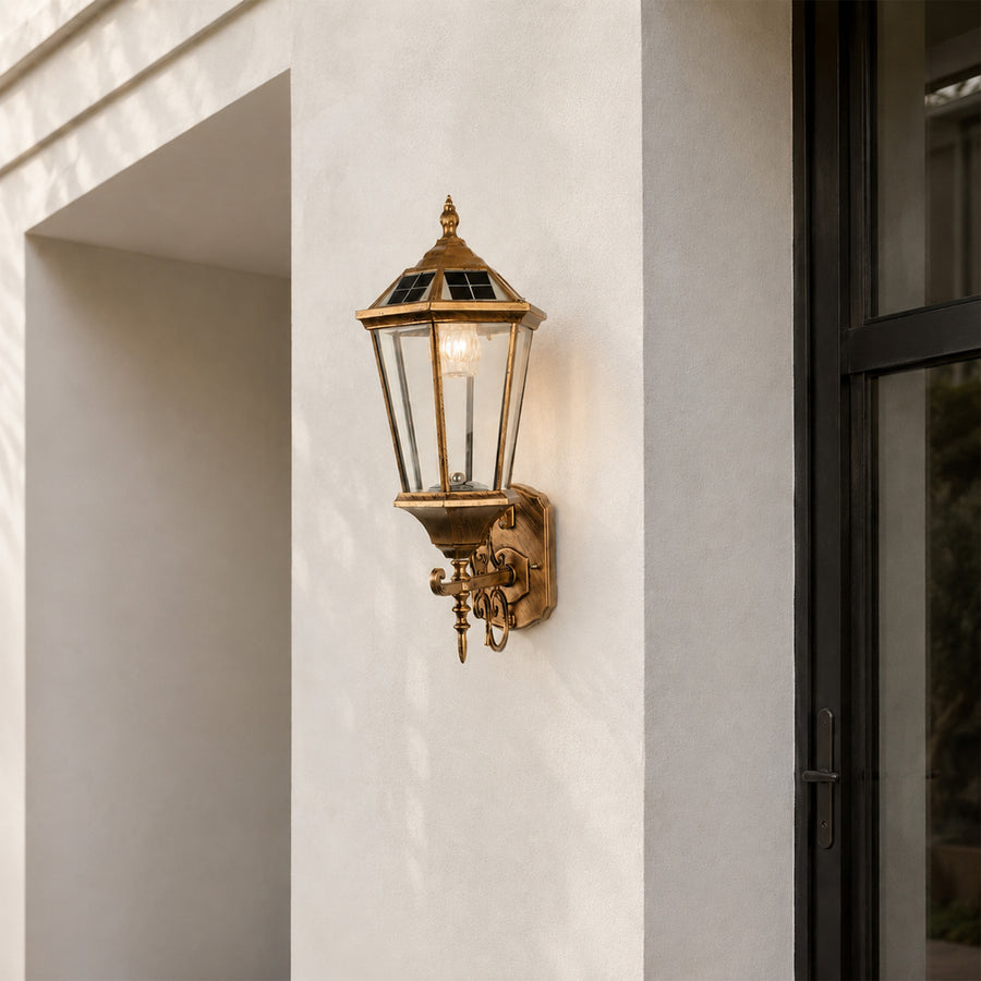 Vintage bronze outdoor wall light lifestyle image beside doorway for elegant classic exterior decor.