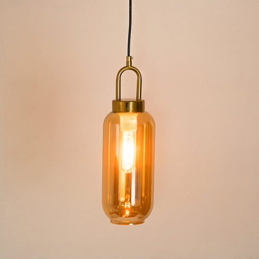 White background image of illuminated cylinder luminex hanging pendant light for elegant dining room decor styling and modern home lighting.