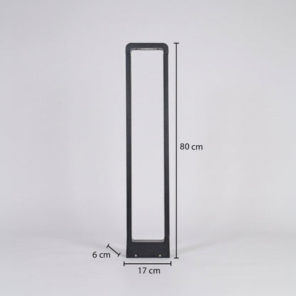 Slim modern outdoor bollard light with rectangular white diffuser and black frame on neutral background 80 cm height 17 cm width 6 cm depth suitable for pathway lighting.