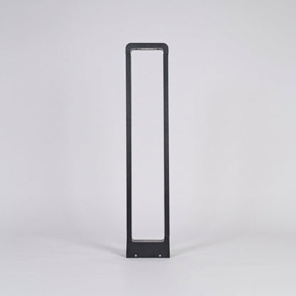 Contemporary outdoor bollard light with slim black frame and frosted panel on neutral background ideal for modern garden or driveway lighting.