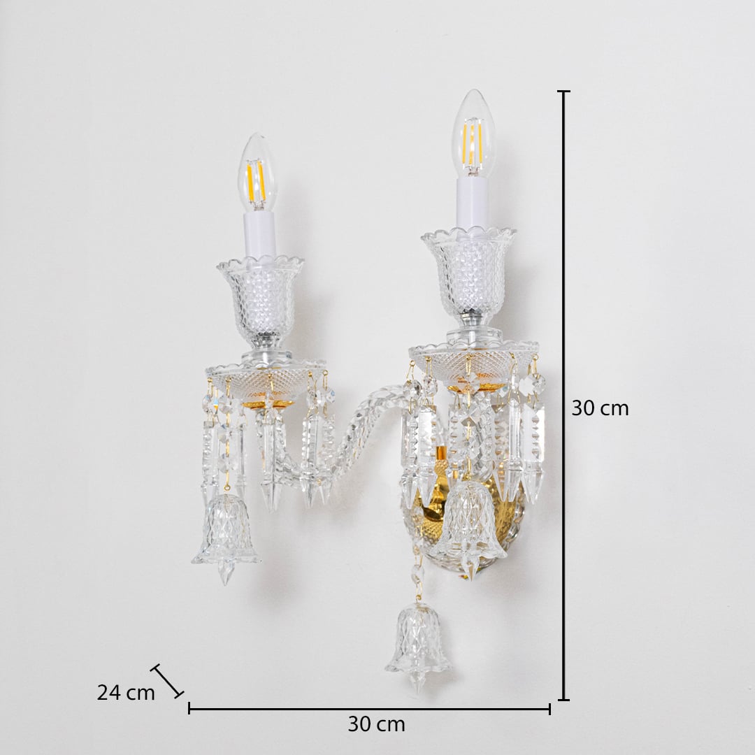 Double arm crystal wall light with gold base and crystal accents size 24cm height 30cm width 30cm depth displayed with measurements.