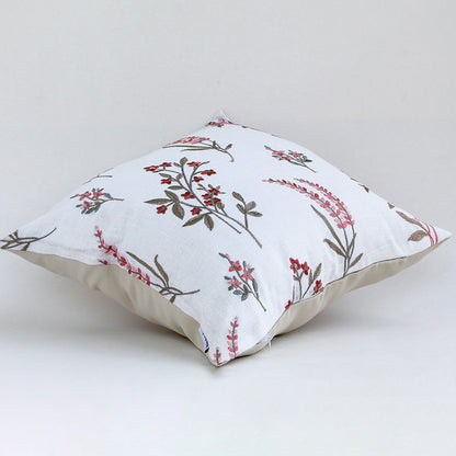 Side view of white cushion cover featuring delicate red floral pattern smooth finish and premium decorative cushion design.