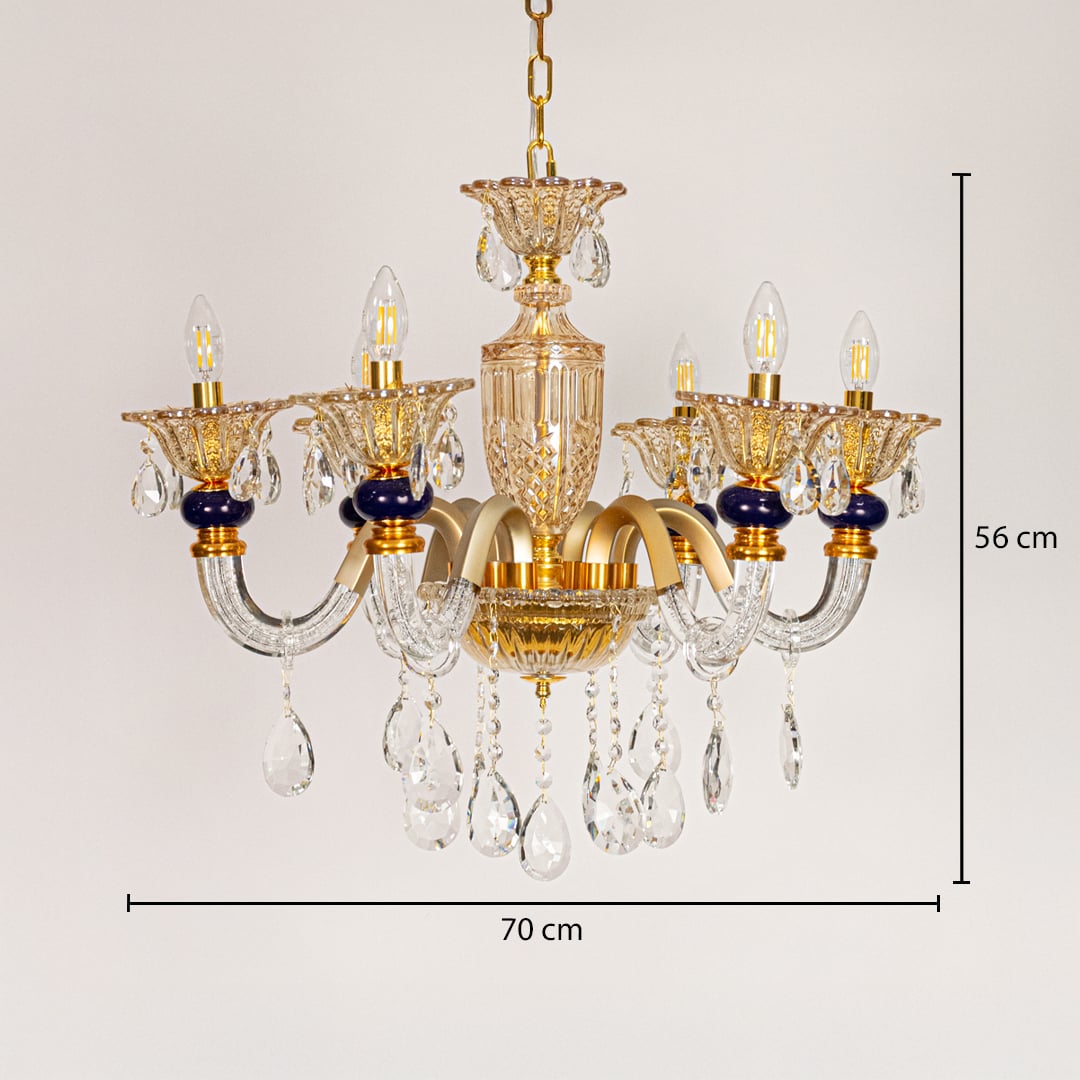 Gold and clear crystal chandelier sized 56 cm height and 70 cm width ideal for elegant living room or dining room ceiling lighting.