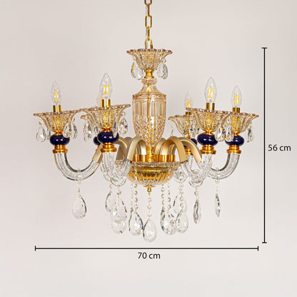 Gold and clear crystal chandelier sized 56 cm height and 70 cm width ideal for elegant living room or dining room ceiling lighting.