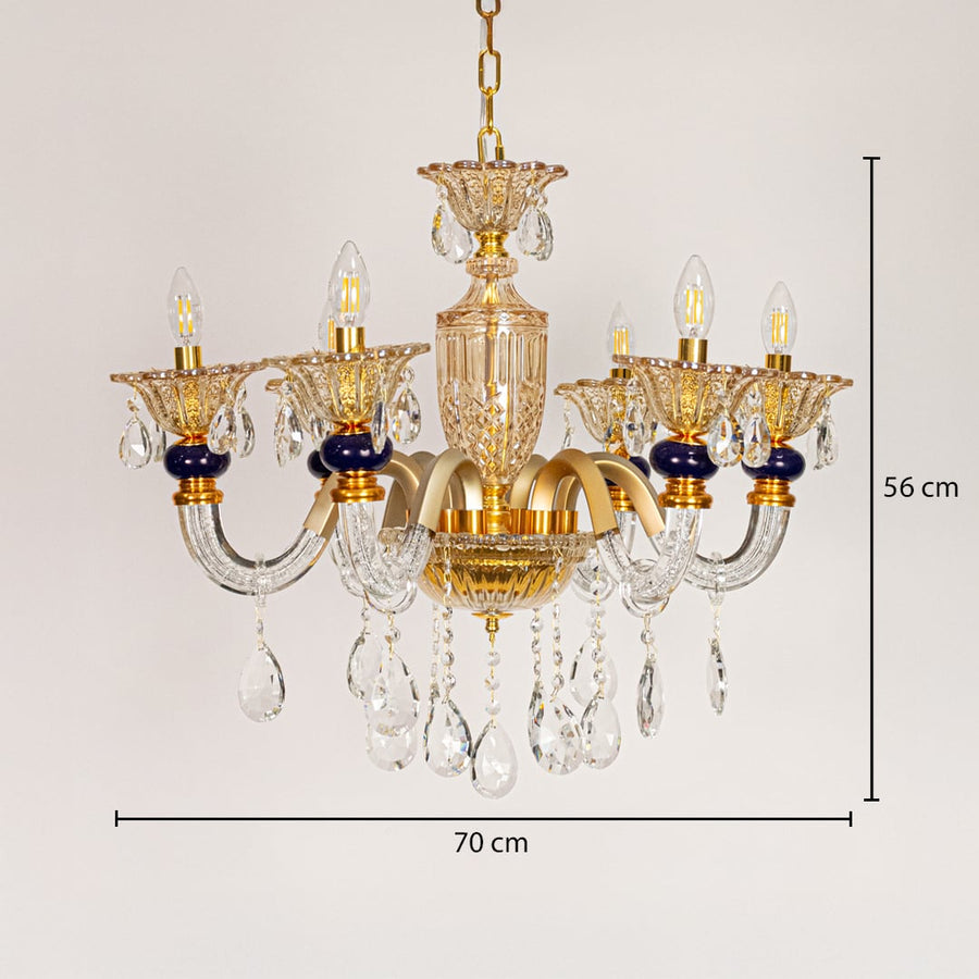 Gold and clear crystal chandelier sized 56 cm height and 70 cm width ideal for elegant living room or dining room ceiling lighting.