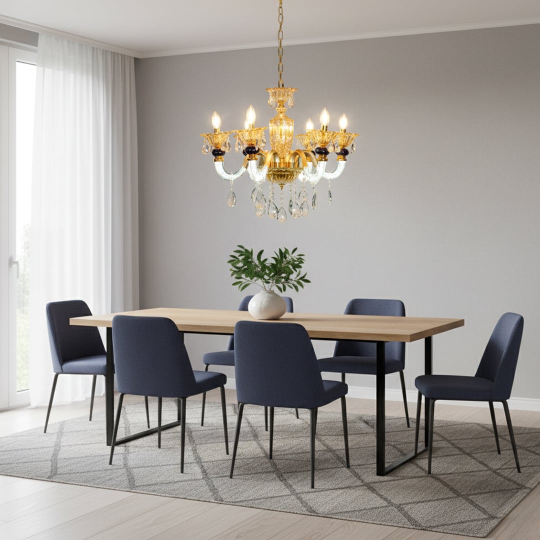 Gold and clear crystal chandelier with navy accents adds elegant warm lighting to living room or dining room ceilings.