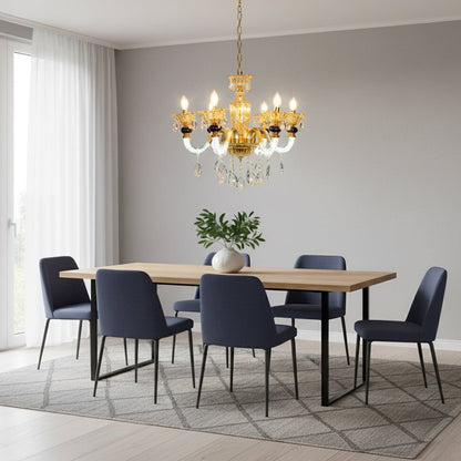 Gold and clear crystal chandelier with navy accents adds elegant warm lighting to living room or dining room ceilings.