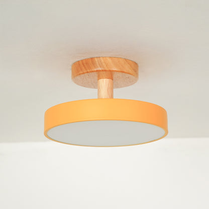 Modern mustard metal and natural wood ceiling light for stylish bedroom and Scandinavian home decor spaces.
