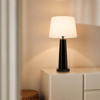 Black metal table lamp with white fabric shade for bedroom bedside table and living room ambient lighting.