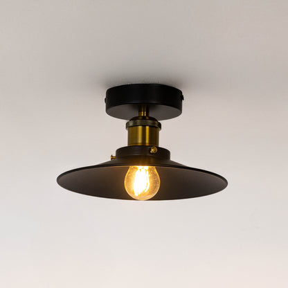 Modern black metal ceiling light with exposed Edison bulb for industrial interior decor and contemporary styling spaces.