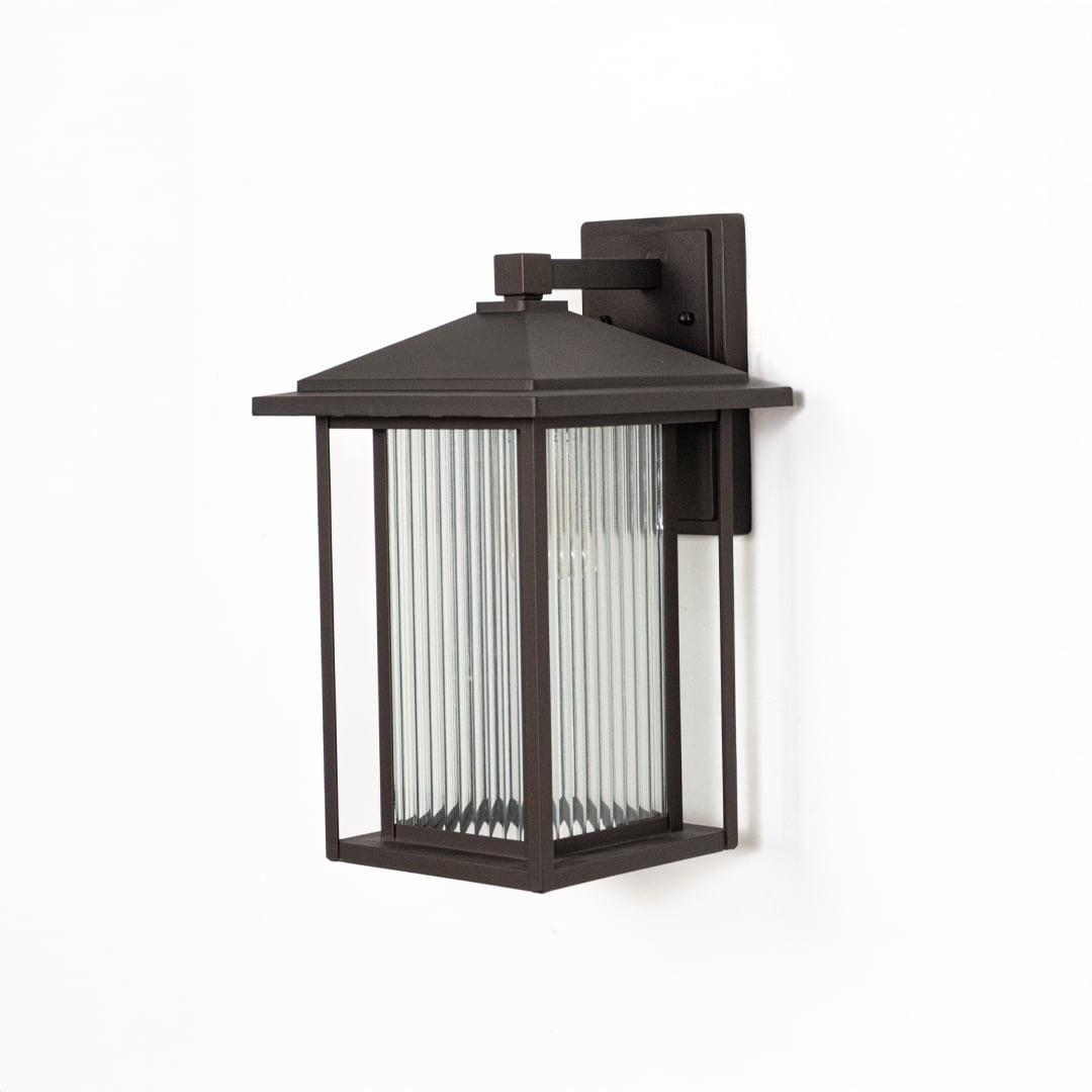 Exterior wall mounted metal lantern turned off displayed on white background showcasing clean structure premium material and classic outdoor styling.