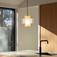 Lifestyle image of marble grain glass hanging pendant lamp for elegant dining room decor styling and modern home lighting design.