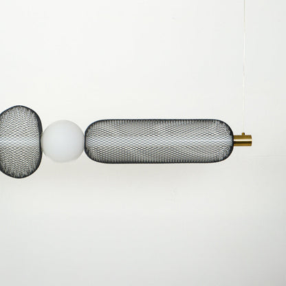 Close view of horizontal wall sconce with ribbed glass shades and metal detailing showcasing premium modern lighting design on clean background.