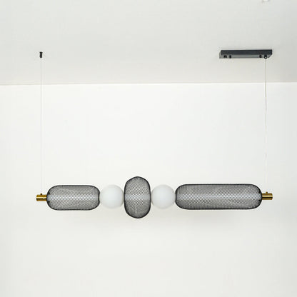 Modern wall light with textured glass cylinders and metal accents mounted on neutral wall background ideal for contemporary bathroom or hallway lighting.