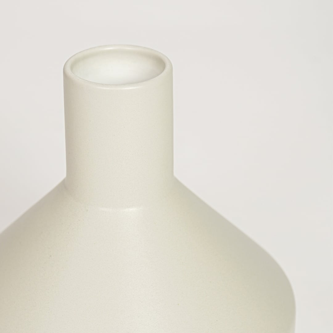 Beige ceramic minimalist decorative vase with smooth matte finish perfect for elegant dried floral display and modern interior decor.