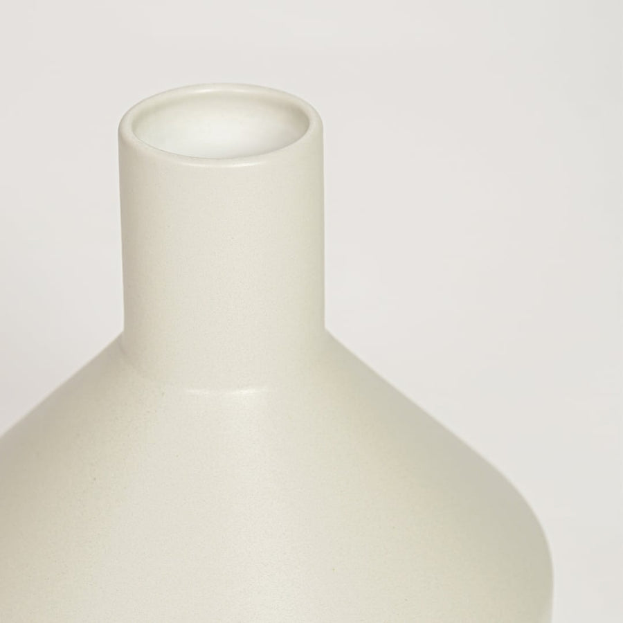 Beige ceramic minimalist decorative vase with smooth matte finish perfect for elegant dried floral display and modern interior decor.