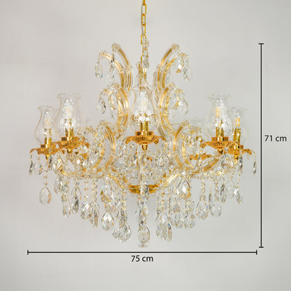 Gold chandelier with clear crystal drops and glass shades, shown against a light gray background with dimension lines indicating 75 cm width and 71 cm height.