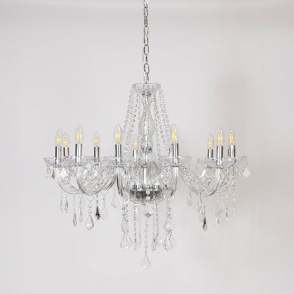 Classic chandelier with silver finish and crystal accents displayed off on white background for luxury home decor.