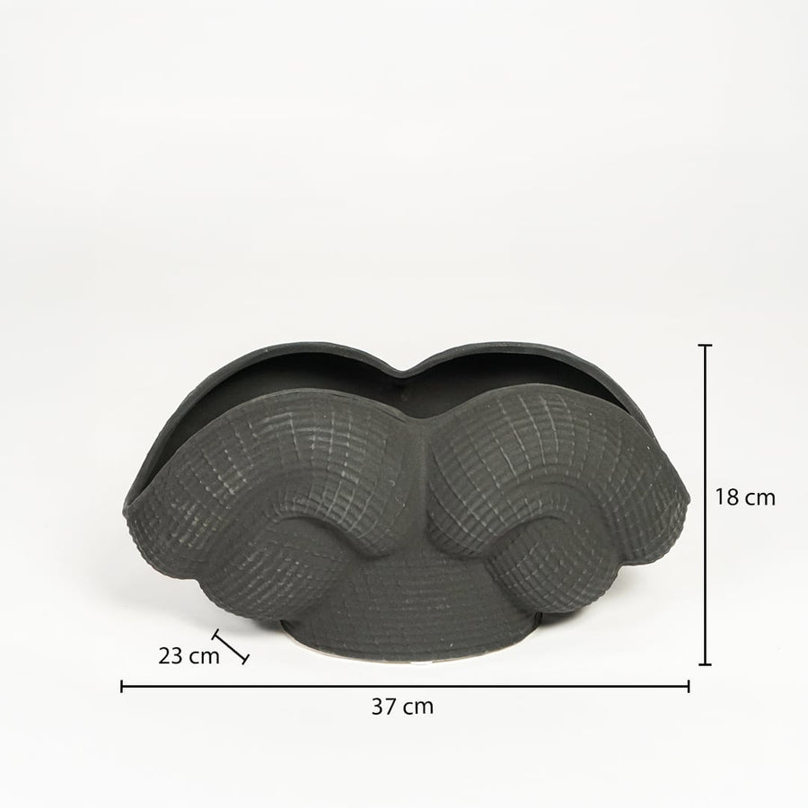 Black ceramic Maria Weave vase measuring 18 cm height 37 cm width and 23 cm depth ideal for tabletop decor placement.