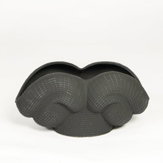 Black ceramic Maria Weave vase with sculpted textured design isolated on clean white background for modern home decor styling.