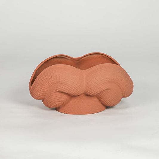 Orange ceramic decorative bowl vase with textured design modern centerpiece vase for shelf console table home decor styling.