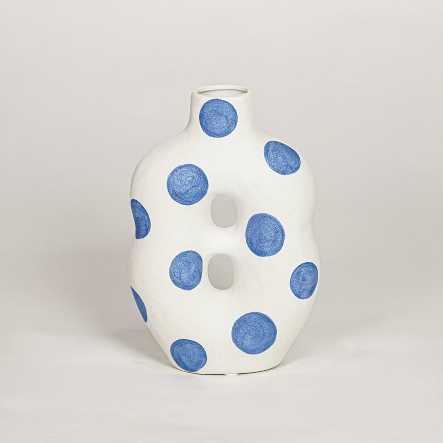 Modern white ceramic decorative vase with artistic blue polka dot design ideal for console table shelf and stylish home decor.