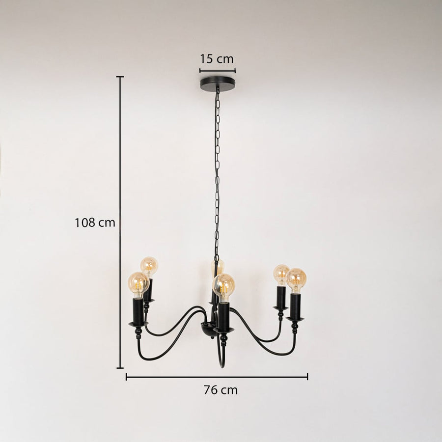 Vintage black metal chandelier with Edison bulbs showing 108cm total height 76cm width 15cm canopy on white background.
