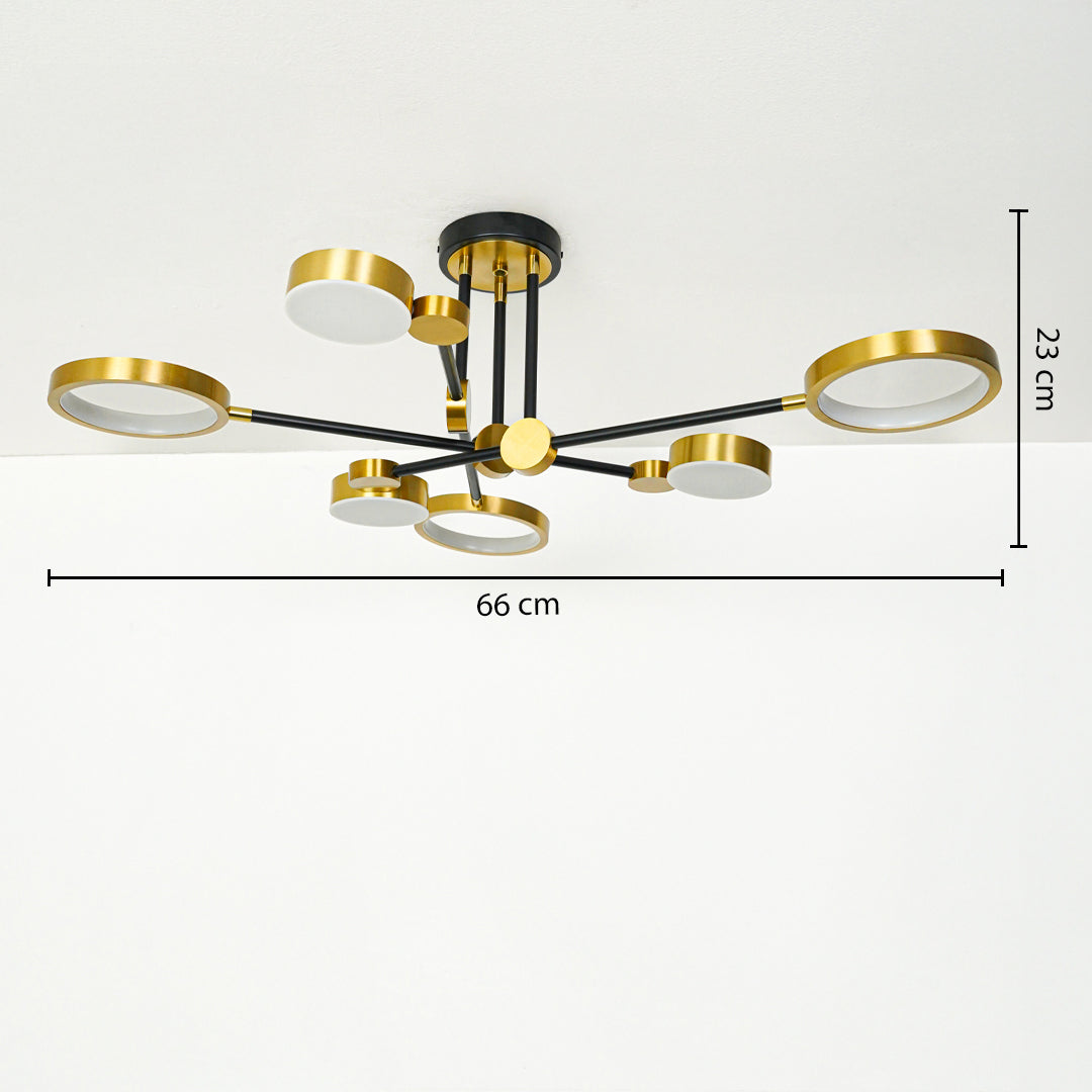 Modern ceiling light with black and gold metal arms and round LED panels mounted on white ceiling background 66 cm width 23 cm height ideal for living room lighting.