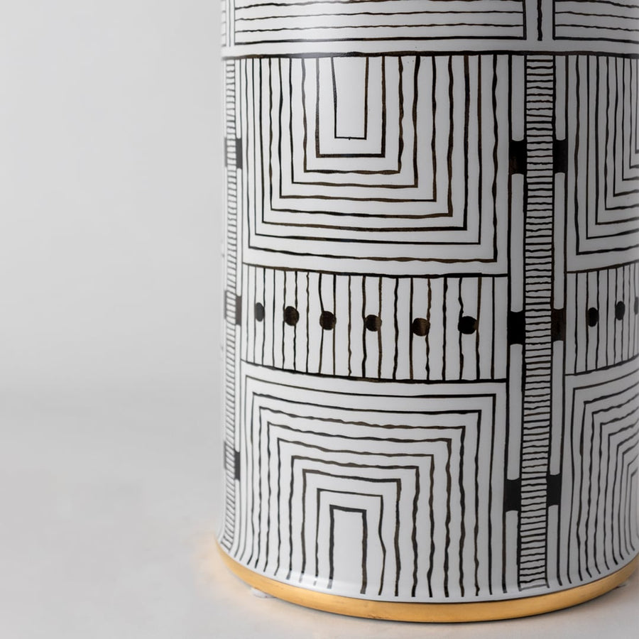 Black and white geometric patterned ceramic jar in a close up view perfect for modern décor styling and bold interior accents.