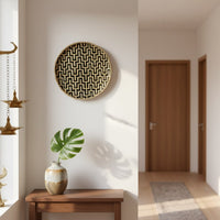 Round wall decor in natural woven finish mounted above console table adding earthy charm and balanced elegance to interior home decor.