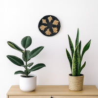 Lifestyle image of medieval touch handwoven sabai grass hanging wall basket for elegant home decor and modern room interior.