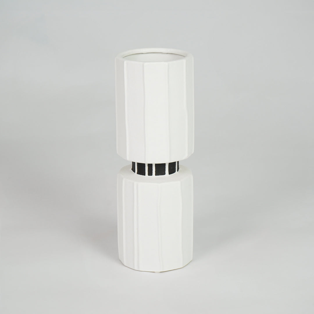 White ceramic vase with silver detail for stylish console table placement and contemporary indoor decor styling.