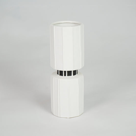 White ceramic vase with silver detail for stylish console table placement and contemporary indoor decor styling.