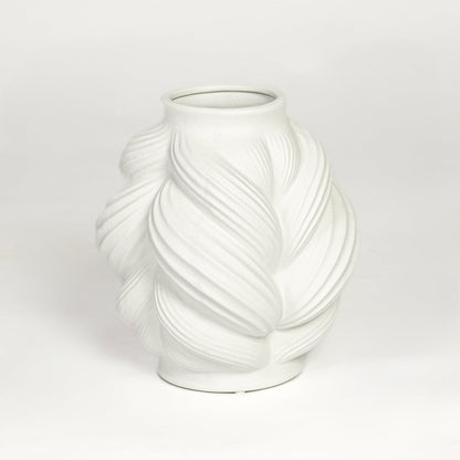 White ceramic sculpted leaf design vase with layered curved pattern isolated on clean white background for modern decor styling.