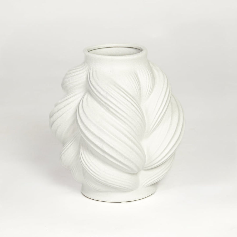 White ceramic sculpted leaf design vase with layered curved pattern isolated on clean white background for modern decor styling.