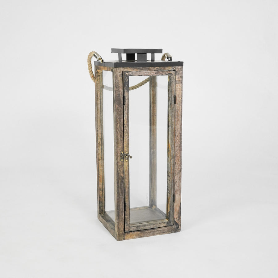 Wooden lantern with glass panels on a white background