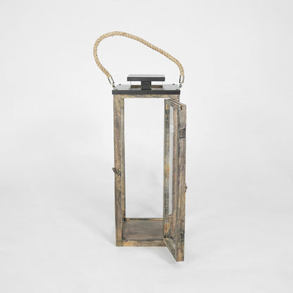 Wooden lantern with a rope handle on a white background