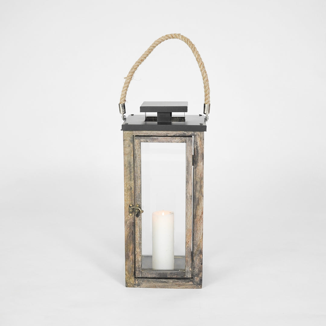Wooden lantern with a candle inside on a white background