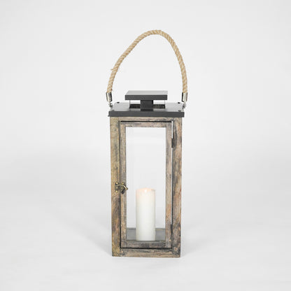 Wooden lantern with a candle inside on a white background