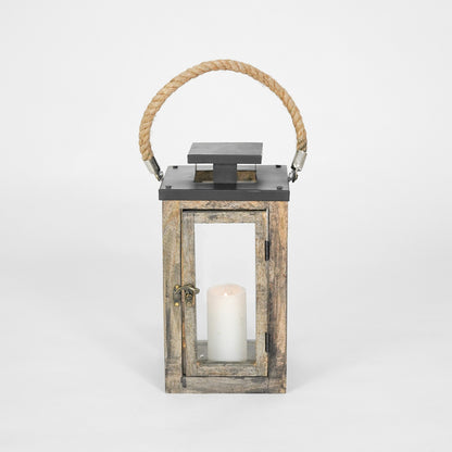 Wooden lantern with a candle inside on a white background