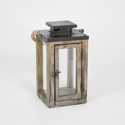 Wooden lantern with a black top on a white background