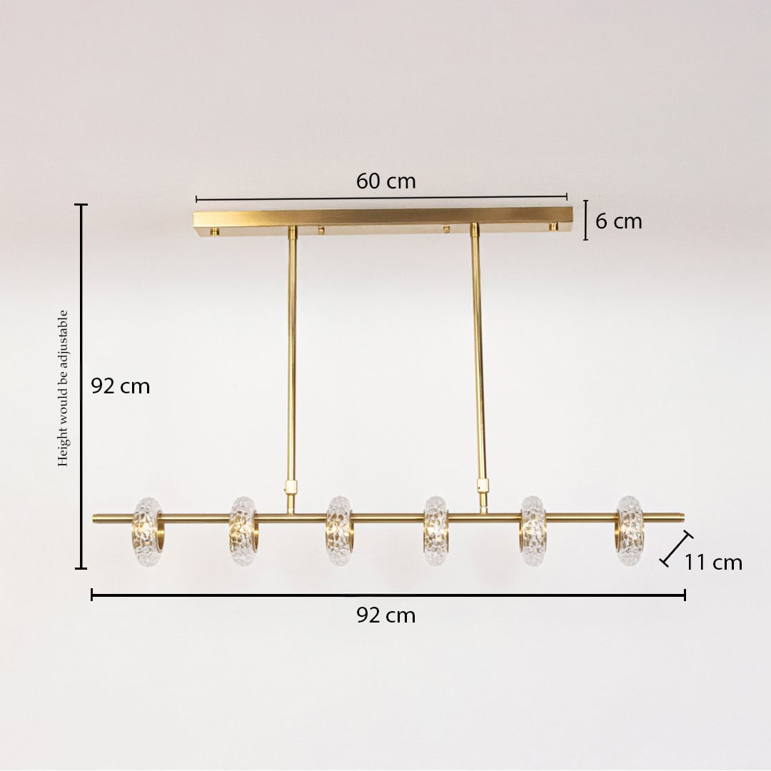 Golden metal chandelier with clear glass rings measuring 92 cm height and 92 cm width ideal for dining room ceiling decor.