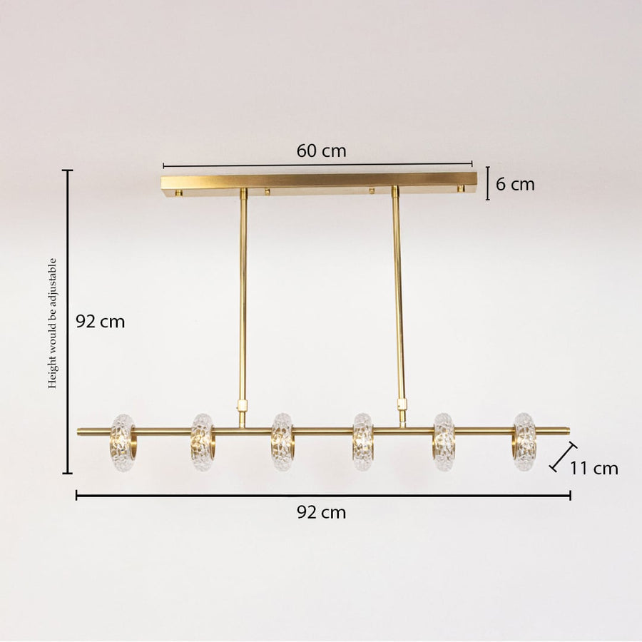 Golden metal chandelier with clear glass rings measuring 92 cm height and 92 cm width ideal for dining room ceiling decor.