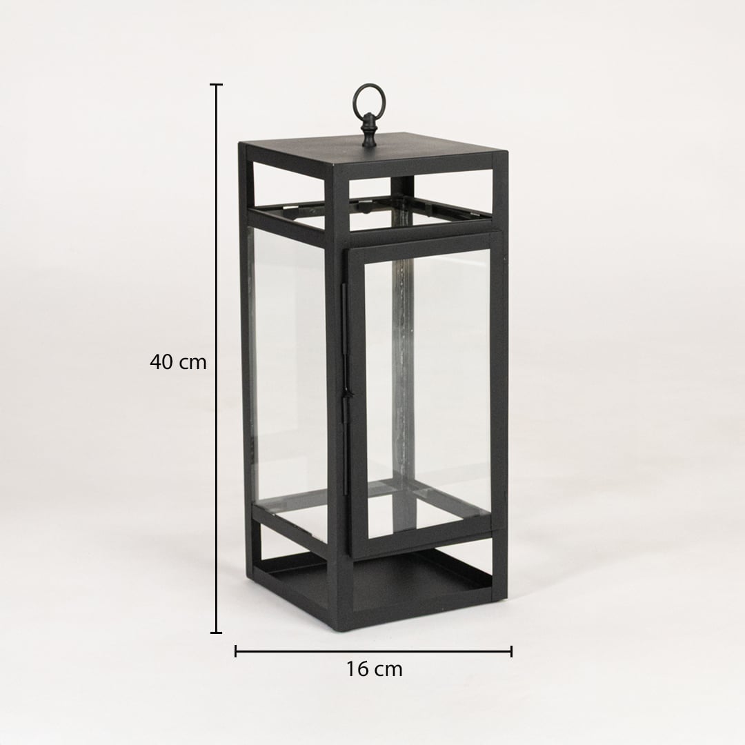 Black metal lantern with clear glass panels measuring 40 cm height and 16 cm width suitable for floor tabletop and outdoor Decor.