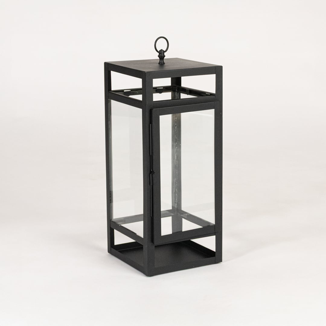 Modern black metal lantern with glass panels on white background ideal for living room balcony and outdoor Decor styling.