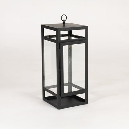 Modern black metal lantern with glass panels on white background ideal for living room balcony and outdoor Decor styling.