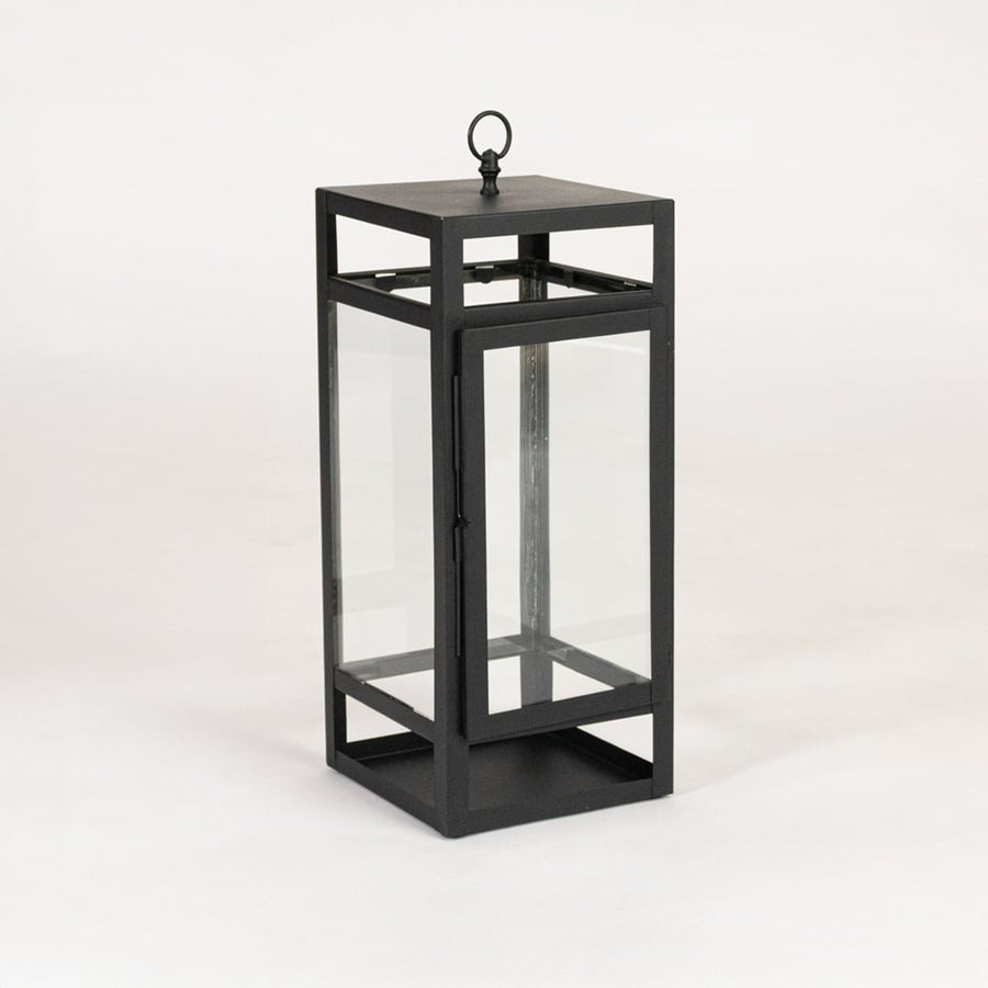 Modern black metal lantern with glass panels on white background ideal for living room balcony and outdoor Decor styling.
