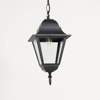 Elegant black metal hanging lantern light with clear glass shade for modern balcony and entryway decor.