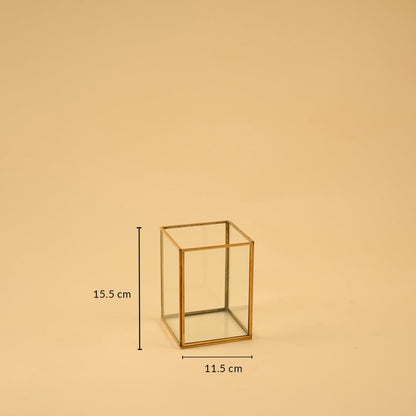 Dimension image of a clear glass rectangular hurricane lantern vase with a gold brass metal frame 15.5 cm height and 11.5 cm width.